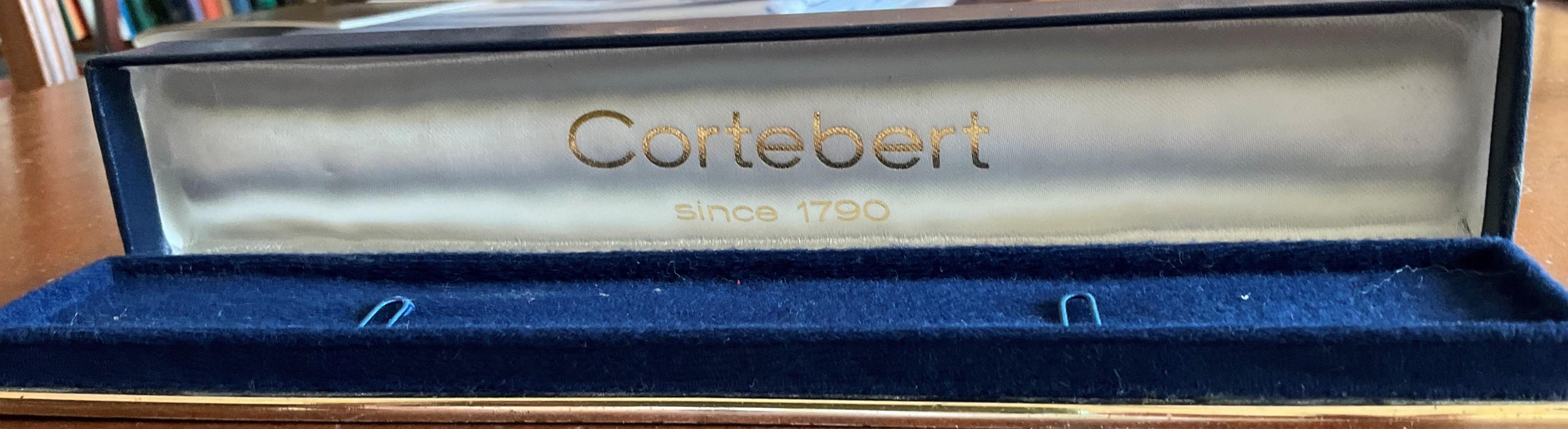 A lady's modern 18ct gold Cortebert manual wind wrist watch, with baton numerals, on 18ct gold integral strap, case diameter 18mm, overall length 17.7cm, gross weight 22 grams.